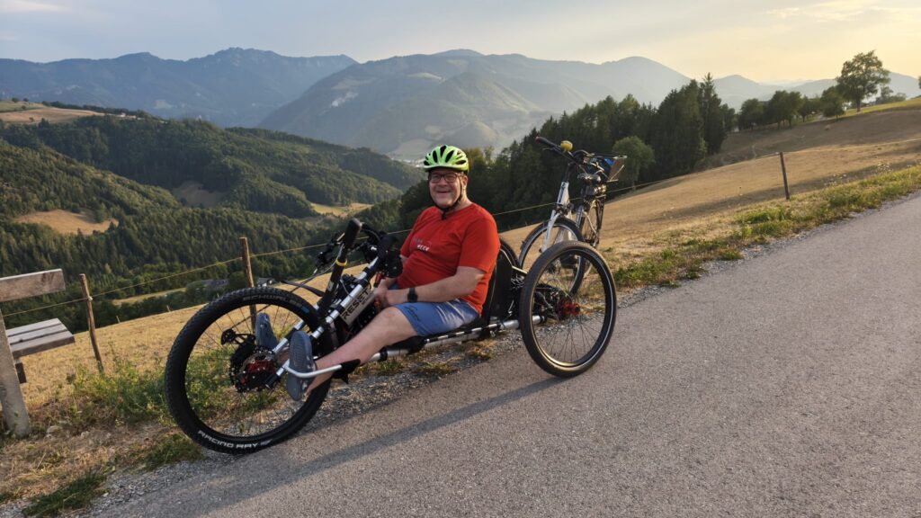 Guy biking the bike Scout with a nice view